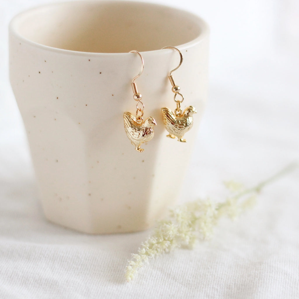 Gold plated dangly chicken earrings