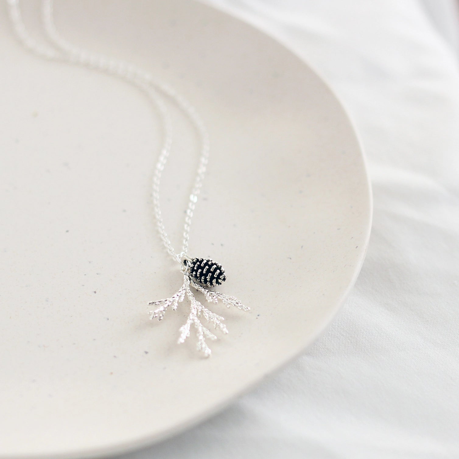 Juniper and Pine cone charm necklace