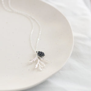 Juniper and Pine cone charm necklace